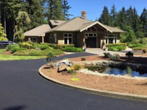 paved road leading to home garage